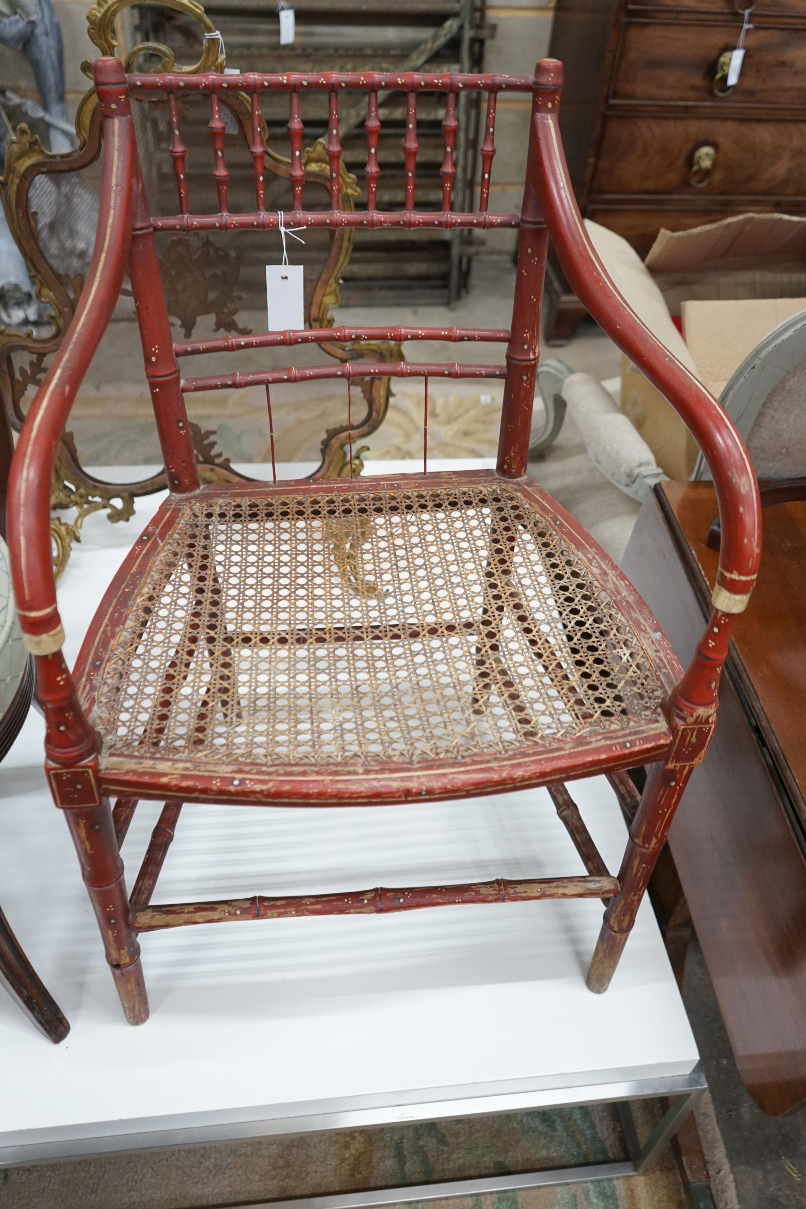 A Regency painted simulated bamboo cane seat elbow chair, width 54cm, depth 43cm, height 79cm